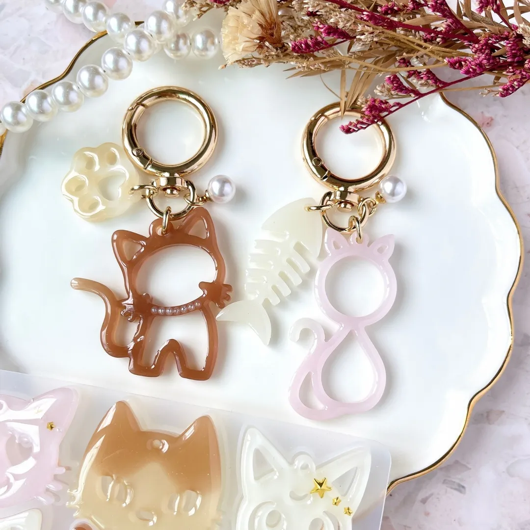 ちゃんまん ◡̈さんのレジン作品 | シリコンモールド ネコ 顔 魚の骨 シルエット 穴あき キー...